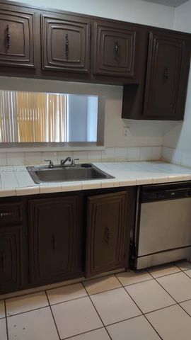 496 NW 165th St Rd D109, Miami, FL 33169