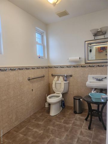 377 Woodcleft Avenue, Freeport, NY 11520