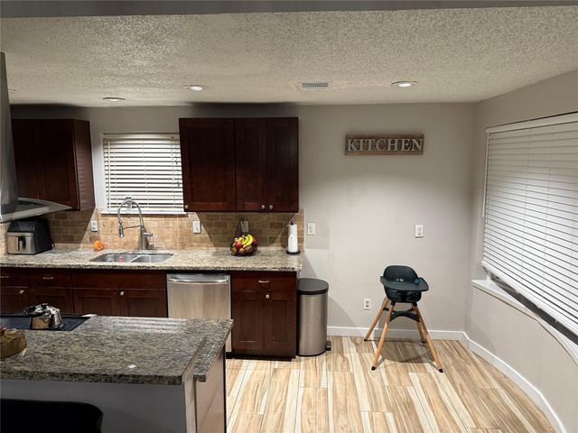 12219 Monticeto Lane, Meadows Place, TX 77477