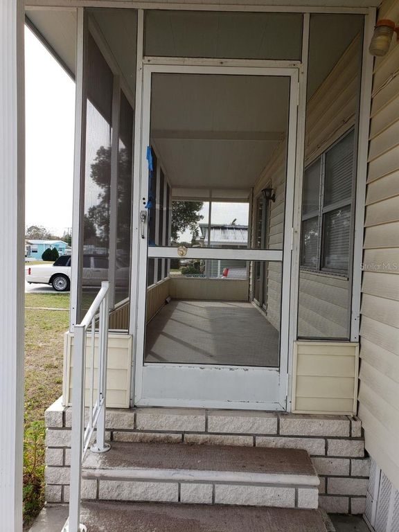 1909 SHADY COVE DRIVE, Holiday, FL 34691