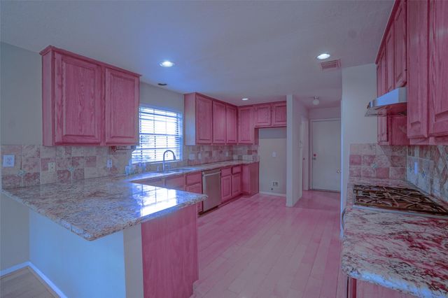 5602 Whisper Ridge Drive, Sugar Land, TX 77479