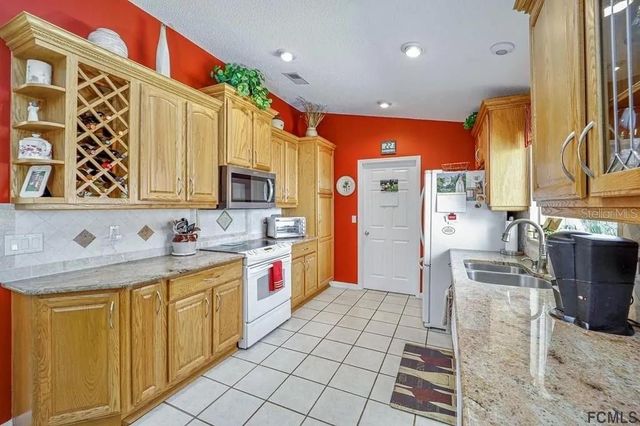 13 CEDARFORD COURT, Palm Coast, FL 32137