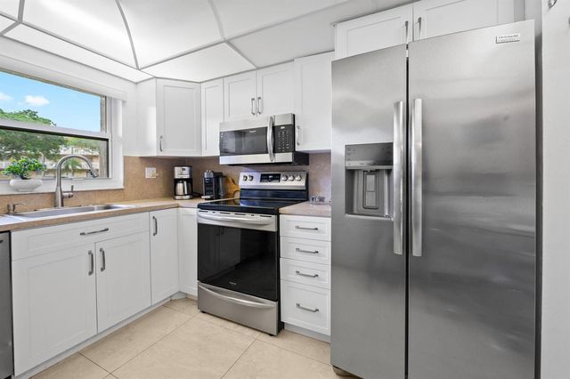 9330 Sunrise Lakes Boulevard 104, Sunrise, FL 33322