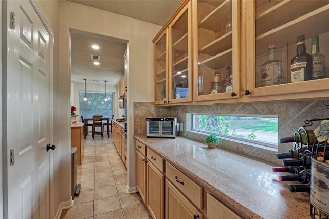 23 Weeping Spruce Place, Conroe, TX 77384