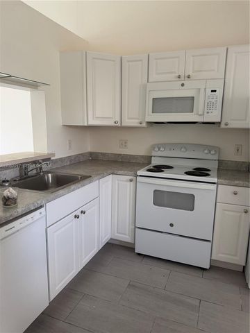 2451 NW 56th Ave 1-205, Lauderhill, FL 33313