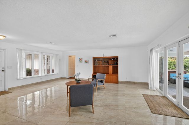 229 Walton Heath Drive, Atlantis, FL 33462