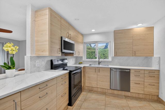 229 Walton Heath Drive, Atlantis, FL 33462