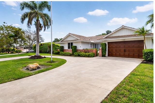 229 Walton Heath Drive, Atlantis, FL 33462