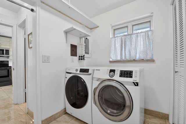 229 Walton Heath Drive, Atlantis, FL 33462