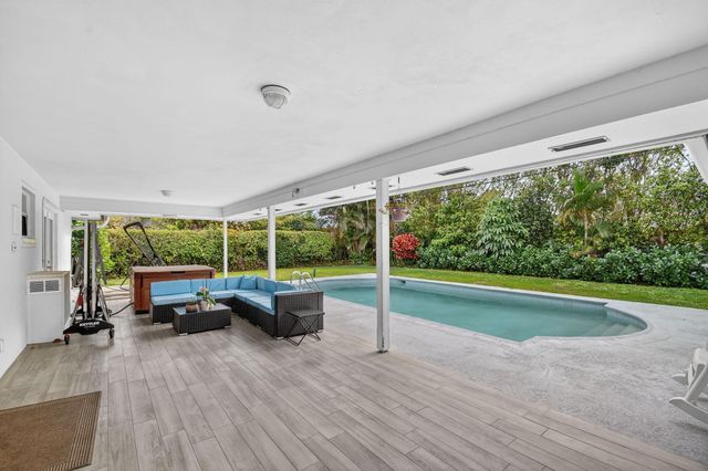 229 Walton Heath Drive, Atlantis, FL 33462