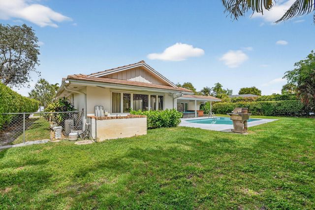 229 Walton Heath Drive, Atlantis, FL 33462