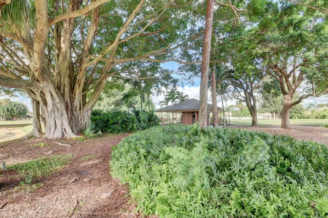 229 Walton Heath Drive, Atlantis, FL 33462