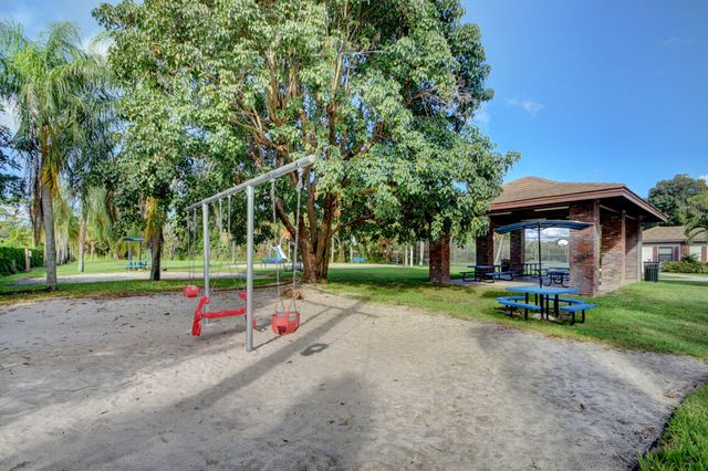 229 Walton Heath Drive, Atlantis, FL 33462