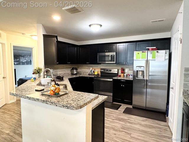 1216 ORCHID Circle 18, Canton Charter Township, MI 48187