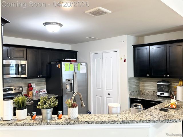 1216 ORCHID Circle 18, Canton Charter Township, MI 48187