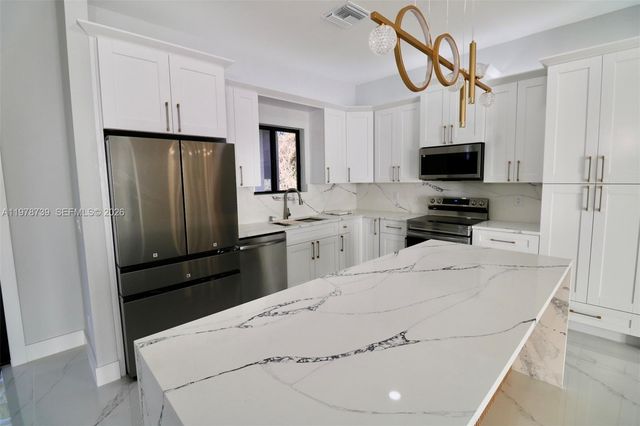 234 Lomax Ave S, Lehigh Acres, FL 33974