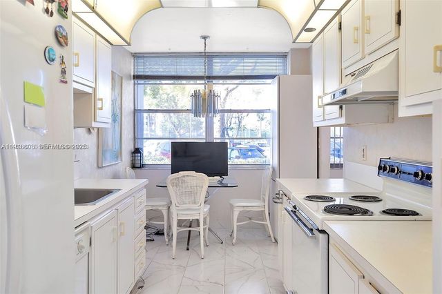 1300 Saint Charles Place L12, Pembroke Pines, FL 33026