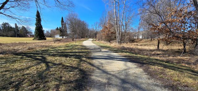 4010 Eastbridge Circle Road, Stockbridge Village, MI 49285