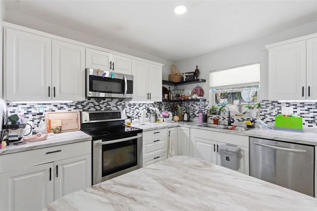 10107 N ASTER AVENUE, Tampa, FL 33612