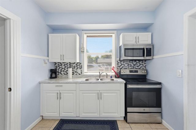 10107 N ASTER AVENUE, Tampa, FL 33612