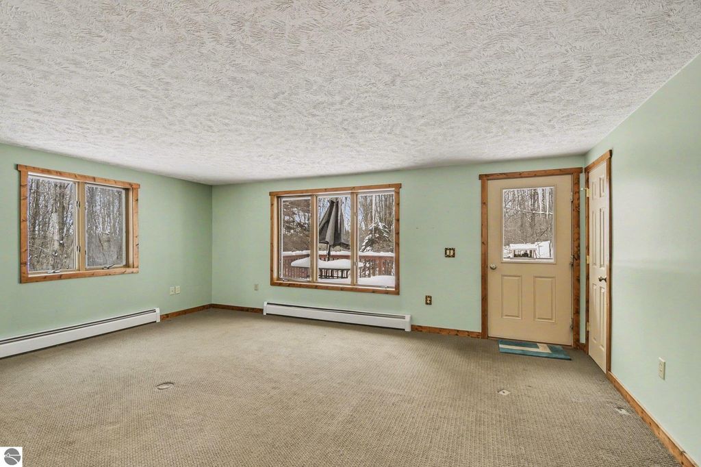 Image 3 of property listing at 11510 E Lee Mann Road, Northport, MI 49670