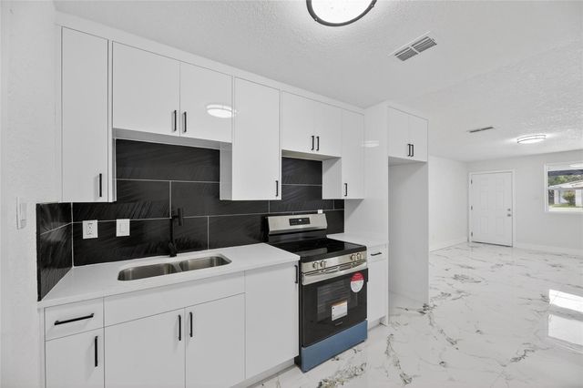 9608 N ASTER AVENUE, Tampa, FL 33612