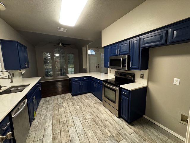 1365 W Branch Hollow Drive, Carrollton, TX 75007