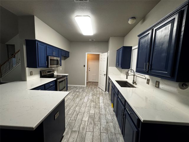 1365 W Branch Hollow Drive, Carrollton, TX 75007