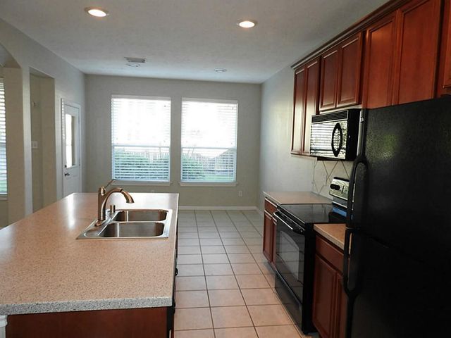 83 W Twinvale Loop, The Woodlands, TX 77384