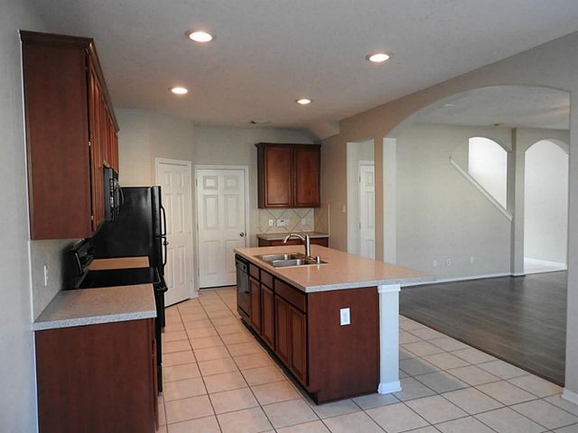 83 W Twinvale Loop, The Woodlands, TX 77384
