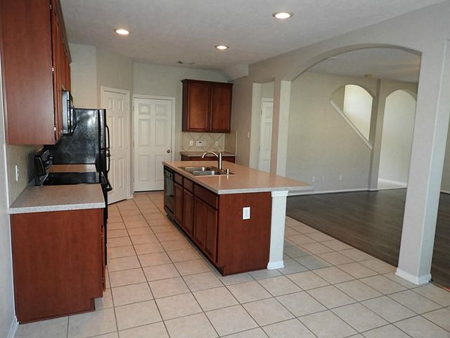 83 W Twinvale Loop, The Woodlands, TX 77384