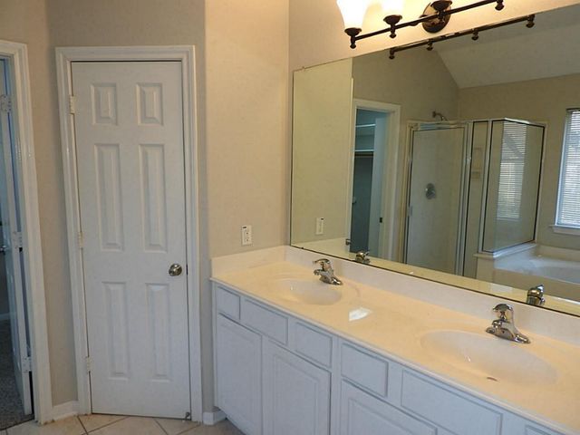 83 W Twinvale Loop, The Woodlands, TX 77384