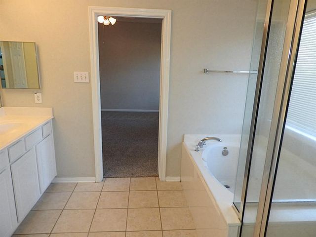 83 W Twinvale Loop, The Woodlands, TX 77384