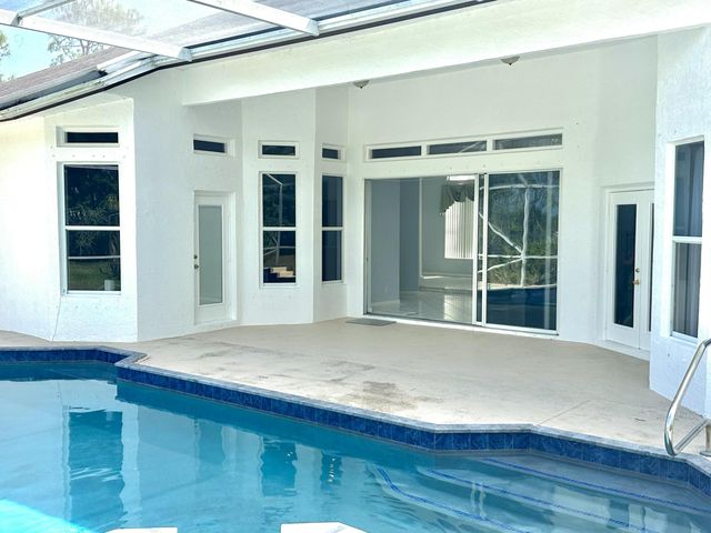 16595 93rd Road N, The Acreage, FL 33470