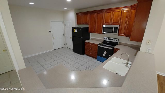 11073 CASTLEMAIN Circle E, Jacksonville, FL 32256