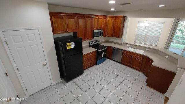 11073 CASTLEMAIN Circle E, Jacksonville, FL 32256