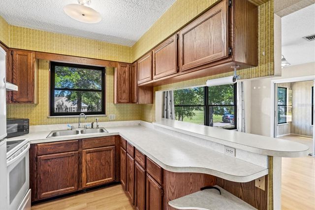 1312 TWIN LAKES AVENUE, Nokomis, FL 34275