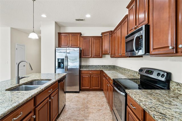 1904 THETFORD CIRCLE, Orlando, FL 32824