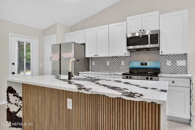 7918 COLLINS RIDGE Boulevard, Jacksonville, FL 32244