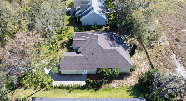 3886 Enchanted Oaks Lane, Sebring, FL 33875