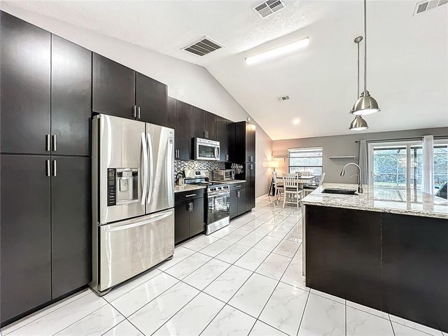 9966 KENDAL DRIVE, Orlando, FL 32817