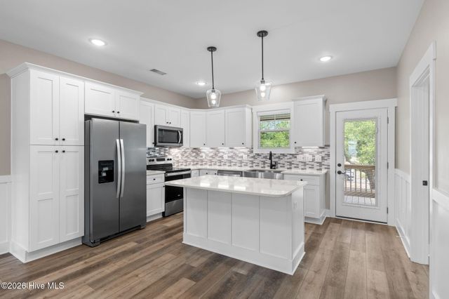 1104 E Oak Island Drive, Oak Island, NC 28465