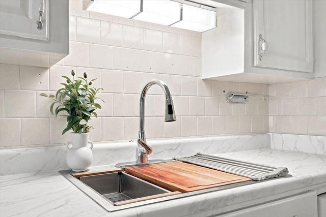 57 Woodcock St, Lowell, MA 01854