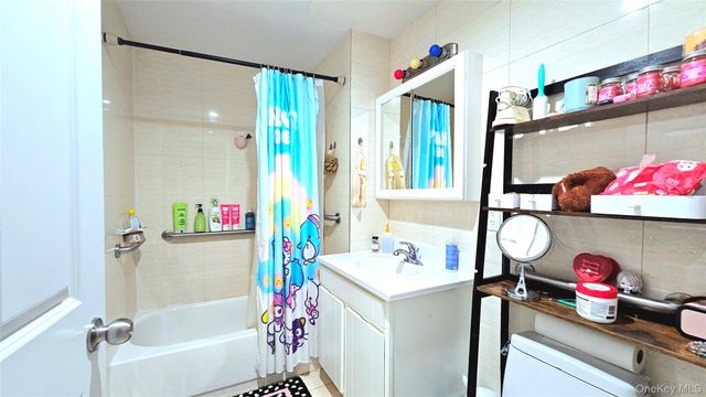 4208 & 4210 164th Street, Flushing, NY 11358