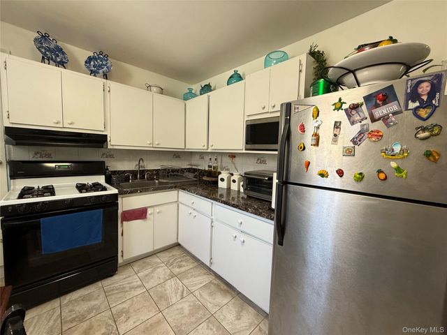 102-08 39th Avenue, Corona, NY 11368