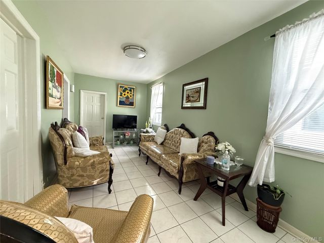 102-08 39th Avenue, Corona, NY 11368