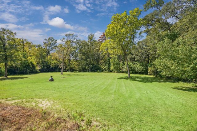 7373 Teaswood Drive, Conroe, TX 77304
