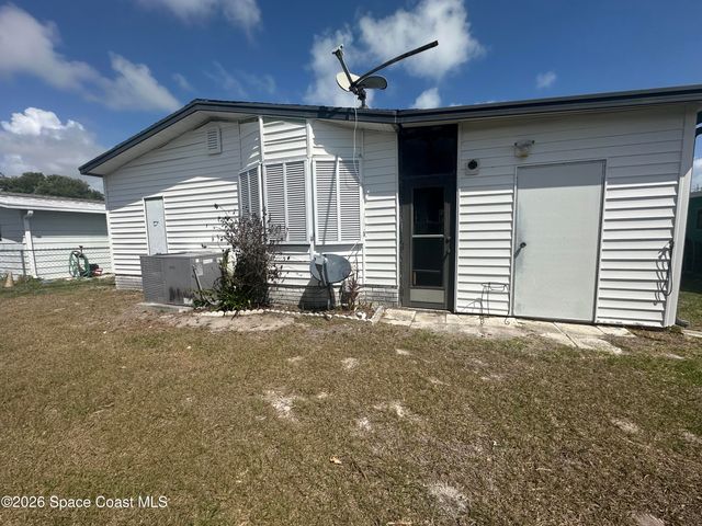 519 Puffin Drive, Barefoot Bay, FL 32976