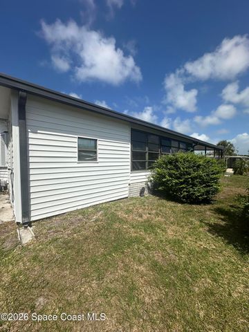 519 Puffin Drive, Barefoot Bay, FL 32976