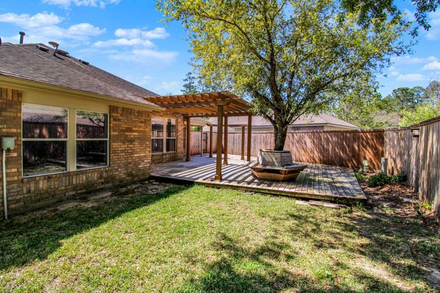 26920 Carriage Manor Lane, Kingwood, TX 77339